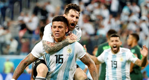 Messi y Rojo clasifican a octavos a una sufrida Argentina