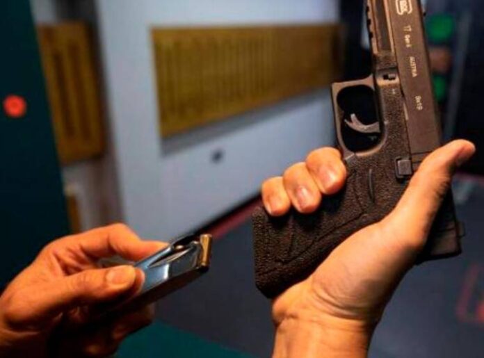 Arma pistola traumática